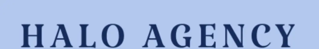 Close-up of dark blue letters on a light blue background.